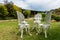 White cast iron table and chairs in garden