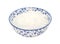 White caster sugar in a blue and white china bowl