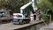 White Cat industrial digger floating on a raft barge on a river canal and excavating