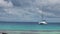White catamaran in ocean.