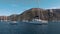 White catamarans and sailing yachts near seashore of Mediterranean sea. Lipari Islands, Sicily, Italy