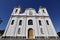 White catholic church under intense blue sky