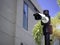 White CCTV cameras on the black pole