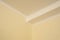 White ceiling molding. Corner part of room interior close up