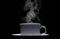 white ceramic coffee cup with floating smoke.