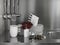 White ceramic dishes and peppers in a kitchen