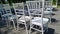 White ceremony chairs. Wedding detail. Before party set