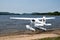 White Cessna float plane on beach