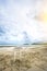 A white chair on the sea beach. A seat with beautiful view. lonely chair seat with wonderful seascape.