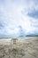 A white chair on the sea beach. A seat with beautiful view. lonely chair seat with wonderful seascape. image for background,