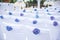 White chairs decorated with Beautiful flowers at a wedding ceremony.