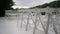 White chairs at a wedding ceremony during the rain. Rain at the wedding