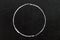 White chalk hand drawing as circle shape on black board