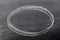 White chalk hand drawing in circle or oval shape on black board background