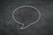 White chalk hand drawing in square bubble speech shape with blank space on blackboard background