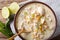 White chili chicken with cannellini beans and corn close-up in a