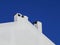 White chimneys and blue sky