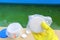 White chlorine tablet in the hand of maintenance personnel for disinfection of swimming pools. Water purification. Green water wit