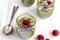 White chocolate cream mousse with matcha, avocado, pistachio, fresh raspberries - healthy vegan dairy free, gluten free