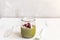 White chocolate cream mousse with matcha, avocado, pistachio, fresh raspberries - healthy vegan dairy free, gluten free