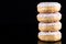 White Chocolate Donuts or Doughnuts Tower on Dark Background