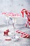 White chocolate peppermint martini with candy cane rim. Christmas holiday party drink