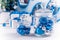 White Christmas gifts with blue ribbons