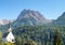 White church and Piz Lischana in Scuol in Switzerland