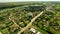 White church and river in Russian village aerial