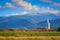 White church tower and Retezat mountains