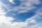 White cirrocumulus clouds in the blue sky. Beautiful sky background