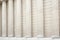 White classical columns and wall background