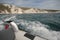 A white cliff from a boat on the Jurassic coastline of the united kingdom
