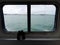 White Cliffs of Dover through grungy ship`s window