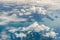 White cloud above island and sea from top view