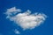 White cloud on a blue background. Horizontal photography