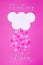 White cloud on pink background with pink and white hearts falling down like snow