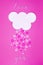 White cloud on pink background with pink and white hearts falling down like snow