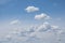 White clouds on the blue sky. Abstract background with clouds on blue sky. In the clear sky high floating clouds