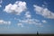 White clouds, blue sky, Plover Scar lighthouse