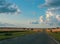 White clouds on the blue sky road and countryside lansdcape