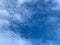A white clouds floating in the blue sky, the cirrocumulus cloud as abstract background