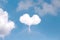 White clouds heart shape design on vast bright bluesky love summer  background