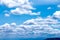 White clouds layer patterns on bright blue sky , summer background
