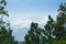 White clouds over distant Himalayan mountains, monsoon landscape of Himalays,Garhwal, Uttarakhand, India. Climate change effect on