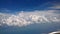 white clouds and raincloud in blue sky view From a plane