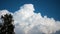 White clouds swirl. Time lapse. Pan shot. Beautiful blue sky with clouds moving cloud cluster swirling upward background