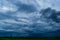 White cloudy sky and blue sky background over the local rice fields in countryside landscape of Thailand