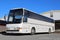 White Coach Bus on a Bus Stop