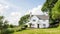 White coastal cottage in the English countryside style by the seaside